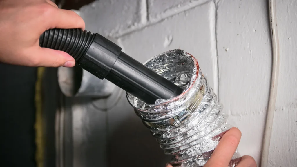 Vacuum nozzle at the opening of a flexible dryer duct